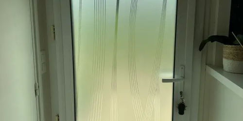 Septembre 2023 : remplacement d'une porte, maison située sur la commune de Quimper (29000)